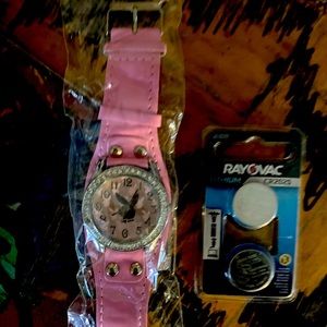 Playboy watch with extra batteries